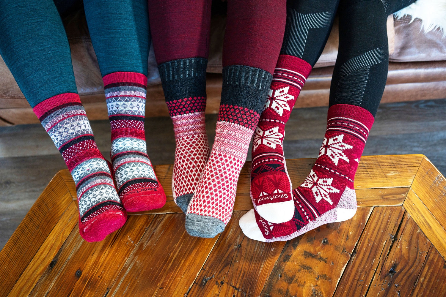 a pair of low socks with herringbone pattern in black and brown are shown