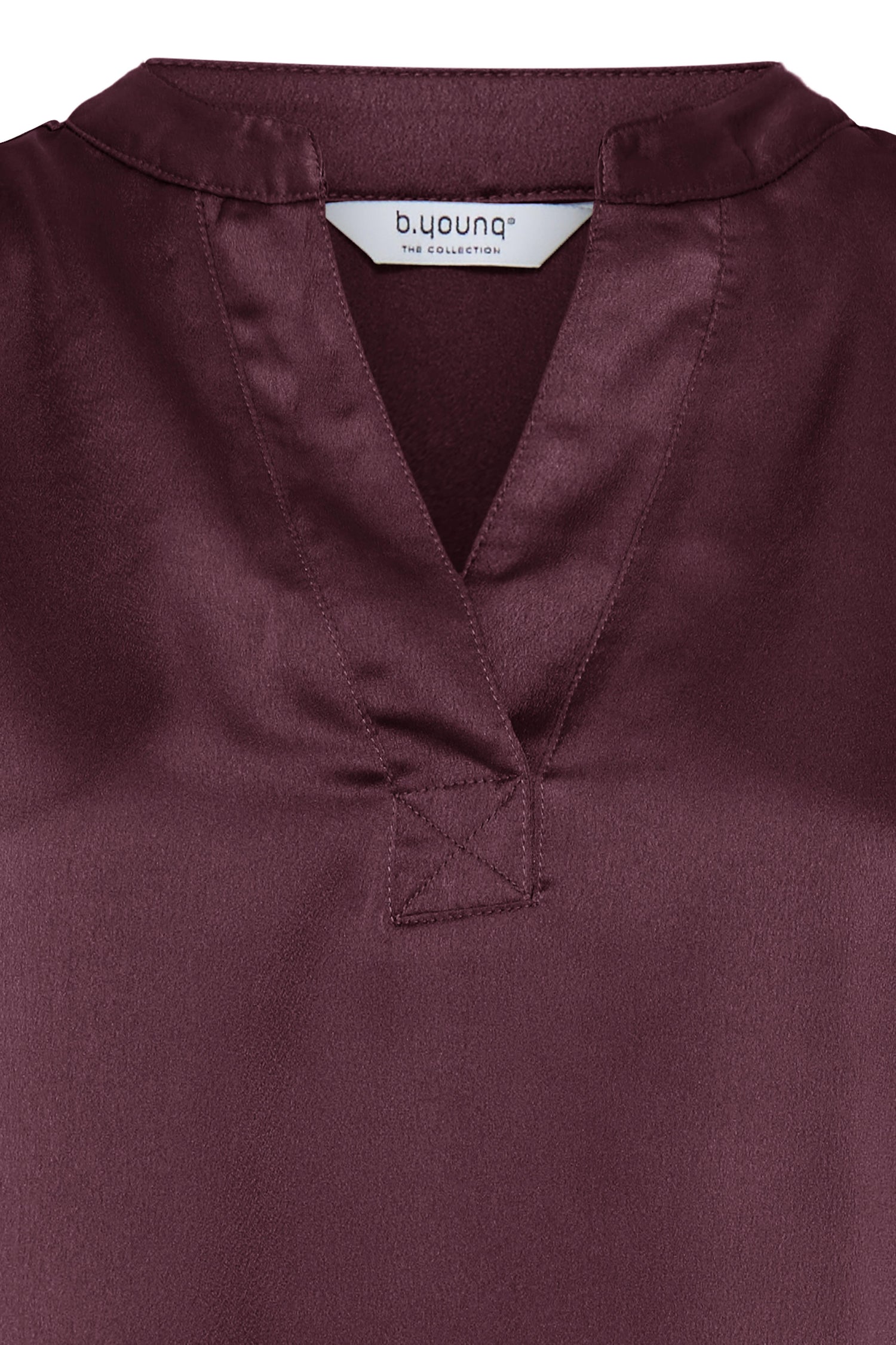 B. Young Selita V Placket Neck Top