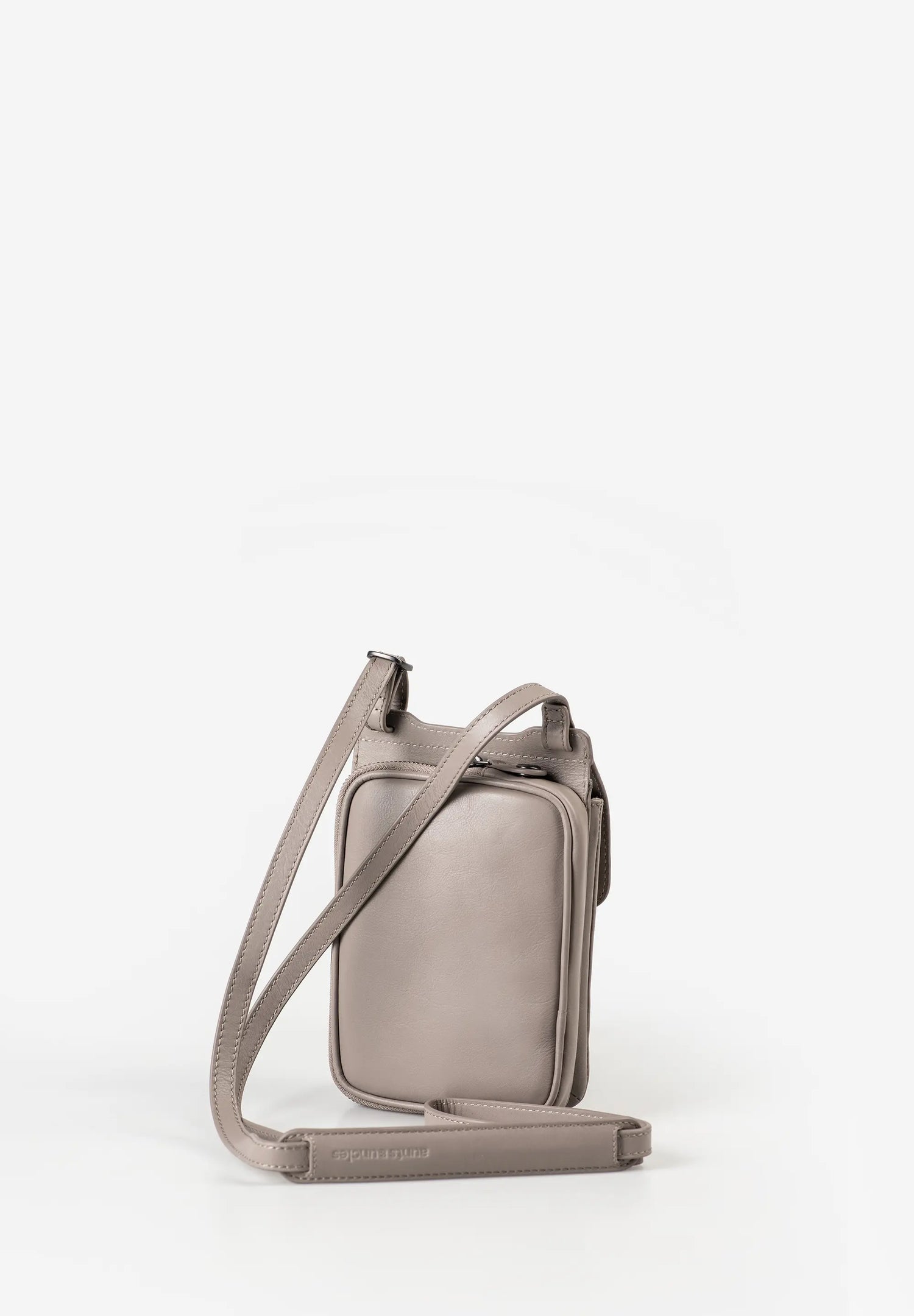 Aunts & Uncles Tulip Leather Phonebag Wallet. A taupe leather crossbody phone bag with a matching adjustable shoulder strap, displayed on a clean white background.