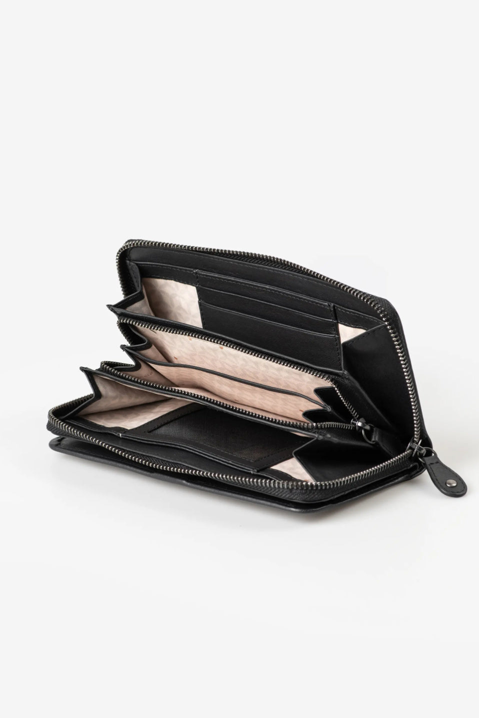 Aunts & Uncles Maple Leather Wallet. An open black leather zip-around wallet with multiple card slots and interior compartments, shown on a clean white background.