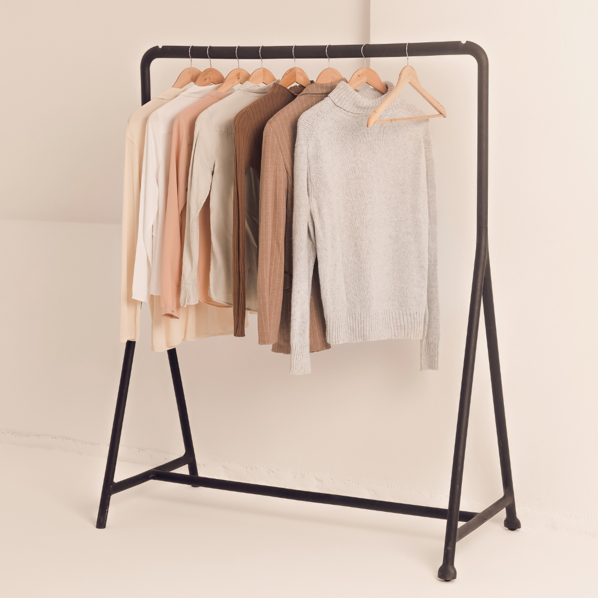 An image shows five items of clothing that are made from sustainable fabrics.