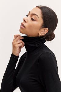B. Young Pamila Roll Neck