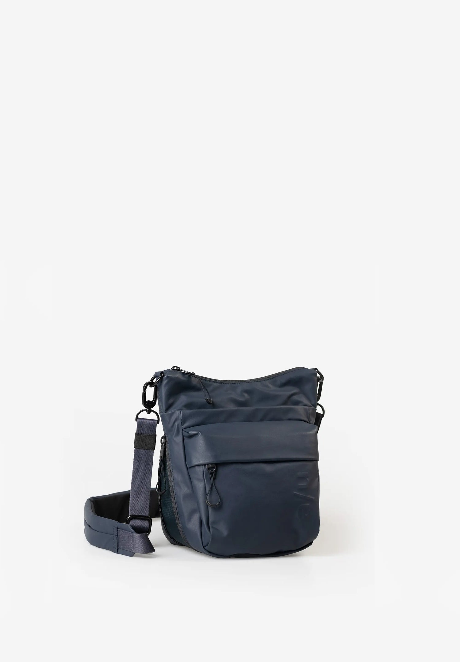 Aunts & Uncles Yura RE Lite Crossbody Bag. A navy blue nylon shoulder bag with a front zippered pocket and an adjustable shoulder strap, photographed on a clean white background.