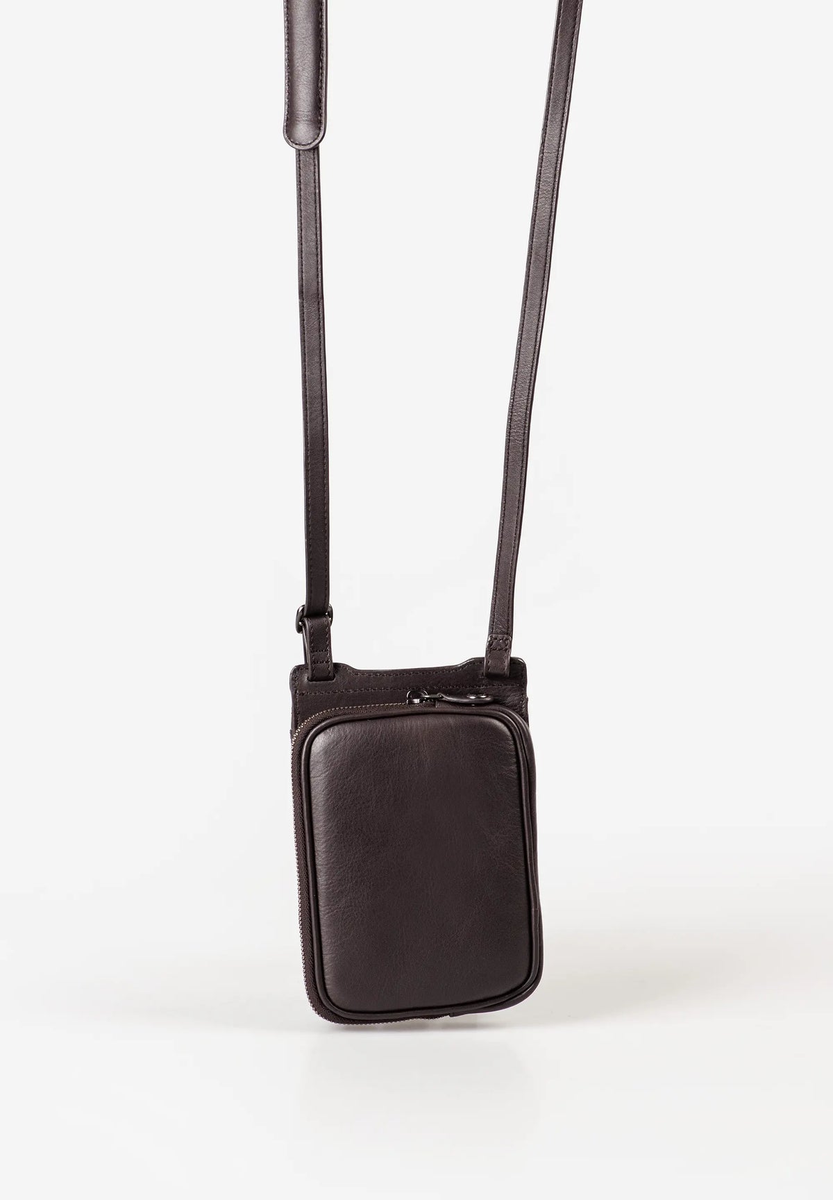 Aunts & Uncles Tulip Leather Phonebag Wallet. A dark brown leather crossbody phone bag with a slim adjustable strap, shown against a plain white background.