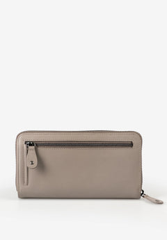 Aunts & Uncles Maple Leather Wallet. A taupe leather zip-around wallet with a front horizontal zipper and a small leather pull tab, shown on a clean white background.