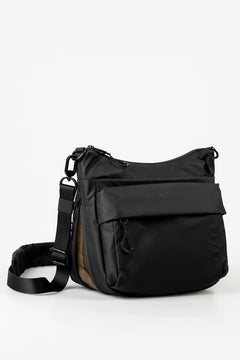 Aunts & Uncles Nanuki RE Lite Crossbody Bag. A black nylon messenger bag with a wide front flap pocket, adjustable shoulder strap, and a brown side panel, photographed on a clean white studio background.