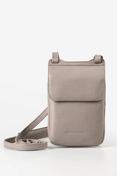 Aunts & Uncles Tulip Leather Phonebag Wallet. A taupe leather crossbody phone pouch with a flap closure and matching strap, shown on a clean white background.